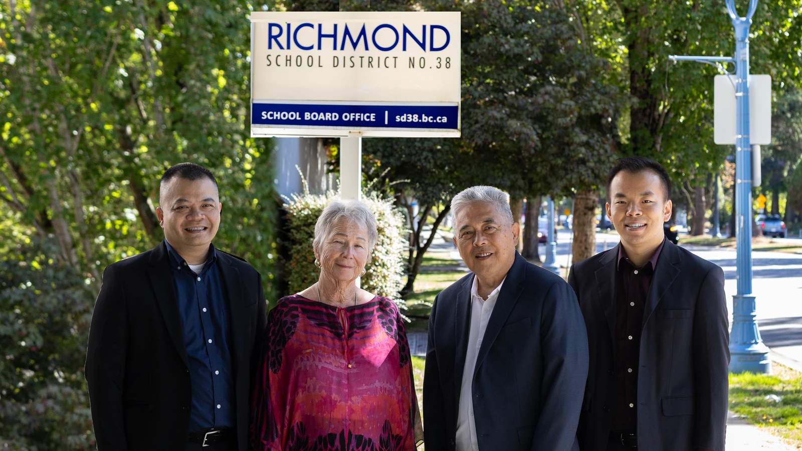 Bill Mok, Heather Larson, Ken Hamaguchi and Martin Li together outside the Richmond School Board office